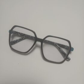 Black Geometric with White Marble and Teal Details