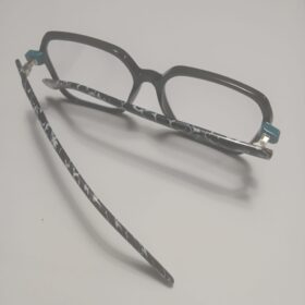 Black Geometric with White Marble and Teal Details - back