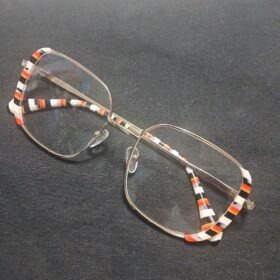 Rounded Gold Squares with Black and Orange Stripe Details